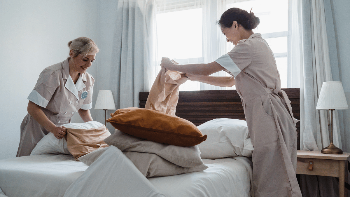 hotel-housekeepers-making-a-bed